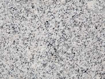 Světle šedá žula Padang Crystal s drobnou zrnitou kresbou Světle šedá žula Padang Crystal s drobnou zrnitou kresbou