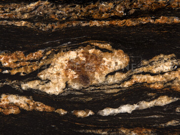 Textura exkluzivního kamene Black Fusion. Konferenční stolek z přírodního kamene Black Fusion. Zakázkové kamenictví TONE OF STONE.