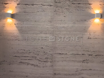 Rustikální obložení stěny v prostorách domácího wellness Zorky a Míry Hejdových. Zakázková výroba kamenictví TONE OF STONE.