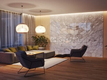 Noční scéna s obložením krbu přírodním mramorem Bianco Carrara a obkladem stěny s použitím techniky bookmatch. Noční scéna s obložením krbu přírodním mramorem Bianco Carrara a obkladem stěny s použitím techniky bookmatch.