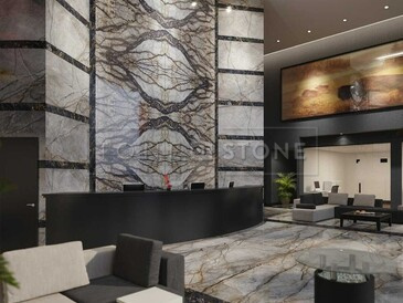 Inspirace - obklad recepce hotelu technikou bookmatch přírodním kamenem Eldorado. Inspirace - obklad recepce hotelu technikou bookmatch přírodním kamenem Eldorado.