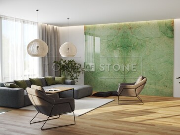 Obklad stěny a krbu přírodním brazilským kvarcitem Jadore. Obklad stěny a krbu přírodním brazilským kvarcitem Jadore.