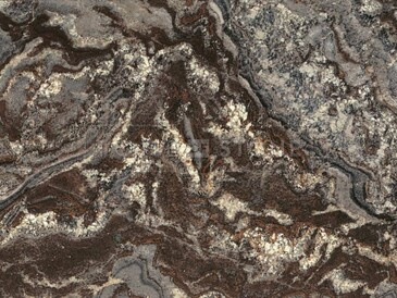 Hnědá kamenná deska žuly Amarone s pestrou žlutou kresbou a zrnitou strukturou Hnědá kamenná deska žuly Amarone s pestrou žlutou kresbou a zrnitou strukturou