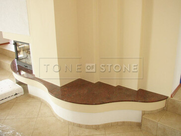 Obložení kolem krbu přírodní žulou. Zakázková výroba kamenictví TONE OF STONE. Obložení kolem krbu přírodní žulou. Zakázková výroba kamenictví TONE OF STONE.