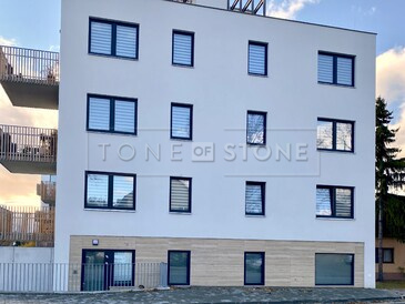 Obložení fasády přírodním kamenem - travertin, zakázková výroba TONE OF STONE