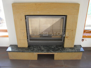 Obložení krbové vložky z přírodního kamene - žula, obklad z mramoru