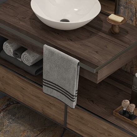 Mramorový obklad koupelny z přírodního kamene Earth Blue v zemitých tónech hnědé a modré Mramorový obklad koupelny z přírodního kamene Earth Blue v zemitých tónech hnědé a modré