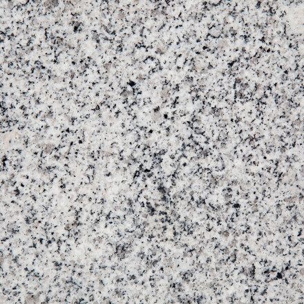 Světle šedá žula Padang Crystal s drobnou zrnitou kresbou Světle šedá žula Padang Crystal s drobnou zrnitou kresbou