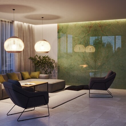 Obložení krbu a stěn technikou bookmatch přírodním kvarcitem Jadore.