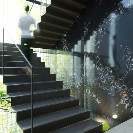 Obklad stěny schodi&scaron;tě čern&yacute;m uměl&yacute;m kamenem Technistone Pearl Delta.