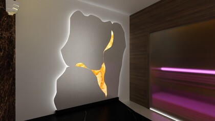 Realizace částečně prosvícené onyxové stěny do wellness z mramoru White Salt a Onyxu Honey